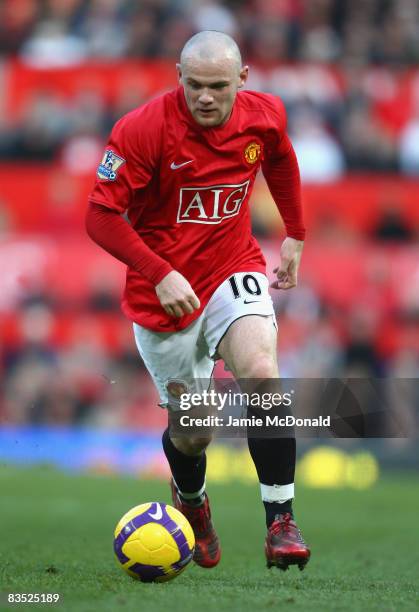 Wayne Rooney of Manchester United in action during the Barclays Premier League match between Manchester United and Hull City at Old Trafford on...