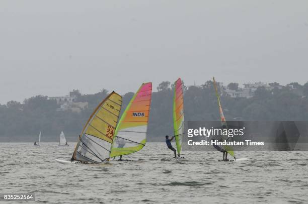Sailors in action during Raja Bhoj multiclass sailing championship organized by Yachting Association of India on August 18, 2017 in Bhopal, India.