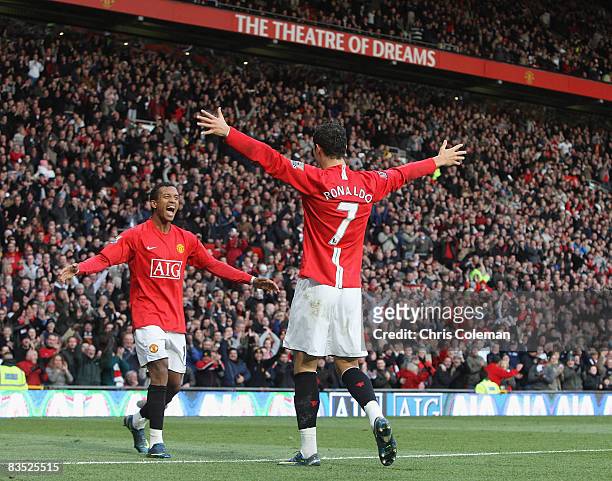Cristiano Ronaldo of Manchester United celebrates scoring their third goal during the Barclays Premier League match between Manchester United and...