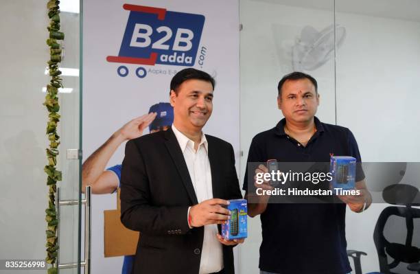 Founder of B2Badda Yogesh Bhatia and Munish Jindal launch the Detel D1 of Rs. 299 mobile phone, on August 18, 2017 in Gurgaon, India. It has 1.44...