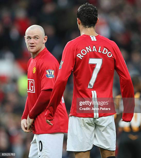 Wayne Rooney and Cristiano Ronaldo of Manchester United in action during the Barclays Premier League match between Manchester United and Hull City at...