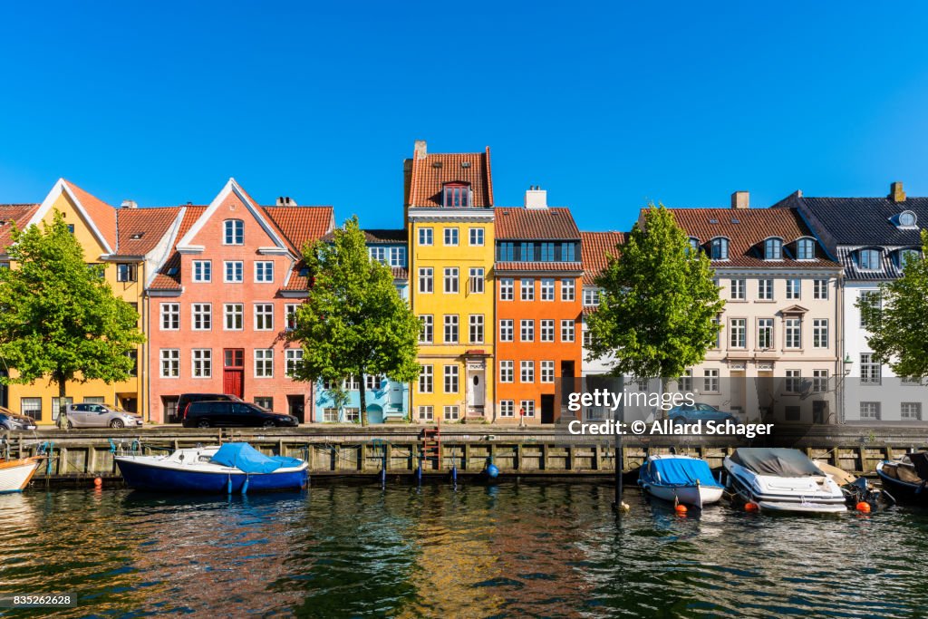 Colourful houses along canal in Copenhagen Denmark