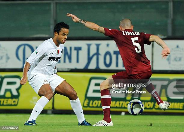 Bruno Cirillo of Reggina challenges Amantino Mancini of Inter during the Serie A match between Reggina and Inter at the Stadio Granillo on November...