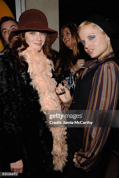 Actresses Alexis Bledel and Mena Suvari attend The Soho Grand Halloween Party Sponsored by Dos Equis at Soho Grand on October 31, 2008 in New York...