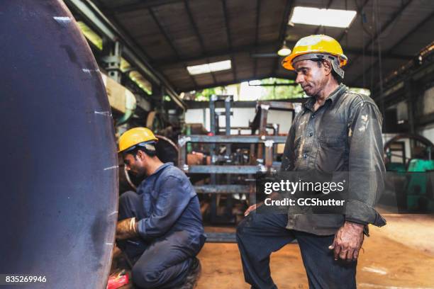 Factory Hand Labourer 2,537 Indian Factory Labourer Stock Photos, High-Res Pictures, and ...