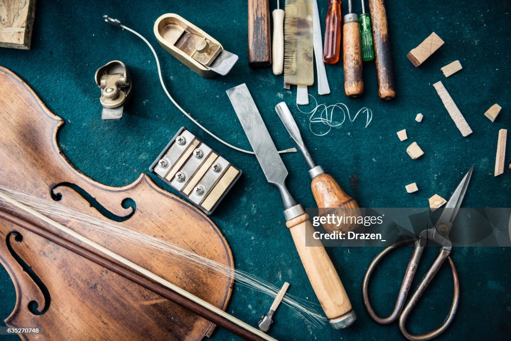 Tools And Repaired Violin In The Music Instrument Repair Shop High-Res ...