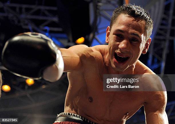 Felix Sturm of Germany celebrates after winning the WBA middleweight world championship fight against Sebastian Sylvester of Germany at the Koenig...