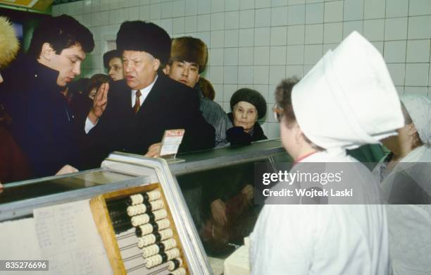 Russian President Boris Yeltsin visiting a dairy shop in Gorki , Russia, on 12th June 1992. On the left from Yeltsin: Boris Nemtsov - chief od...
