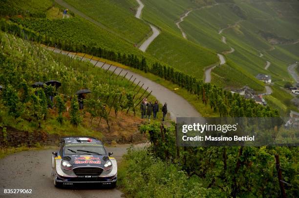 Sebastien Ogier of France and Julien Ingrassia of France compete in their M-Sport WRT Ford Fiesta WRC during Day One of the WRC Germany on August 18,...