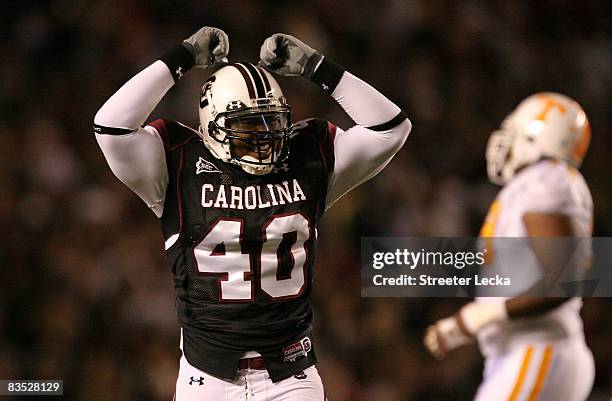 Eric Norwood of the South Carolina Gamecocks celebrates after making a defensive stop against the Tennessee Volunteers during their game at...