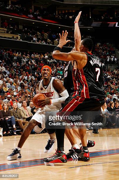 Shawn Marion of the Miami Heat guards against Gerald Wallace of the Charlotte Bobcats on November 1, 2008 at the Time Warner Cable Arena in...