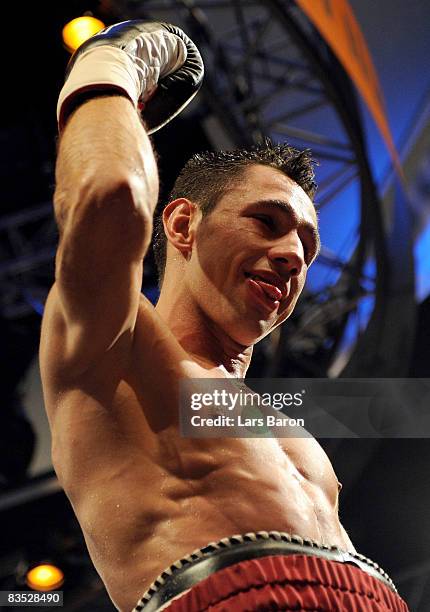 Felix Sturm of Germany celebrates after winning the WBA middleweight world championship fight against Sebastian Sylvester of Germany at the Koenig...