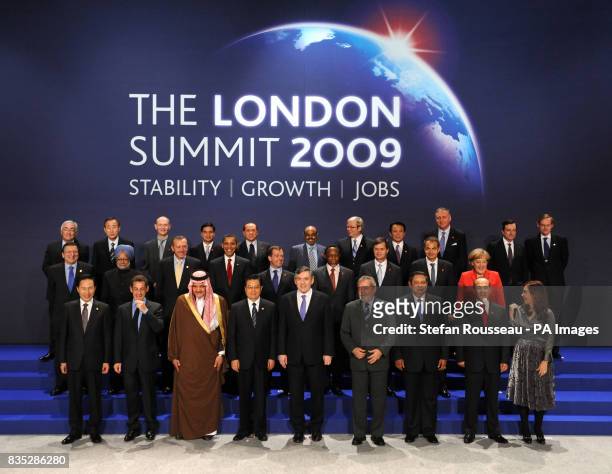 Delegates of the G20 London summit pose for a group picture in the Excel Conference Centre, east London. Back from left: Dominique Strauss-Kahn,...