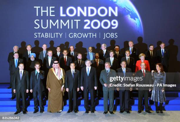 Delegates of the G20 London summit pose for a group picture in the Excel Conference Centre, east London. Back from left: Dominique Strauss-Kahn,...