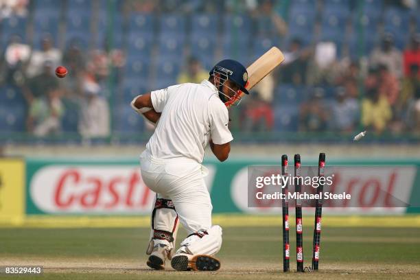 Rahul Dravid of India is bowled by Brett Lee during day five of the Third Test match between India and Australia at the Feroz Shah Kotla Stadium on...