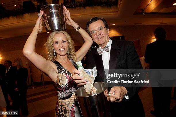 Presenter Katja Burkart and husband Hans Mahr selling lots during the Unesco Benefit Gala For Children 2008 at Hotel Maritim on November 01, 2008 in...