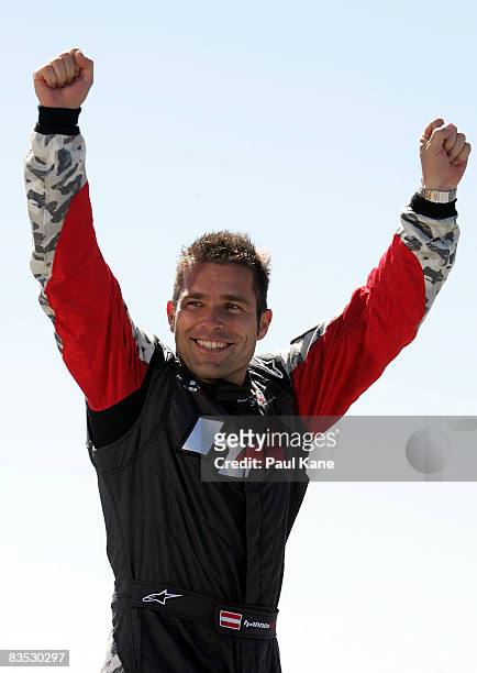 Hannes Arch of Austria celebrates winning the 2008 World Championship during the final round of the Red Bull Air Race World Series held on the Swan...