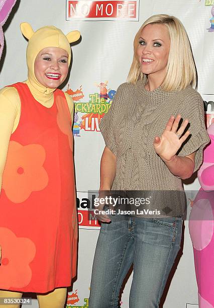 Actress Jenny McCarthy poses with the Backyardigans at "Backyardigans Live!" breakfast benefit for Malaria No More at The Nokia Theater on November...