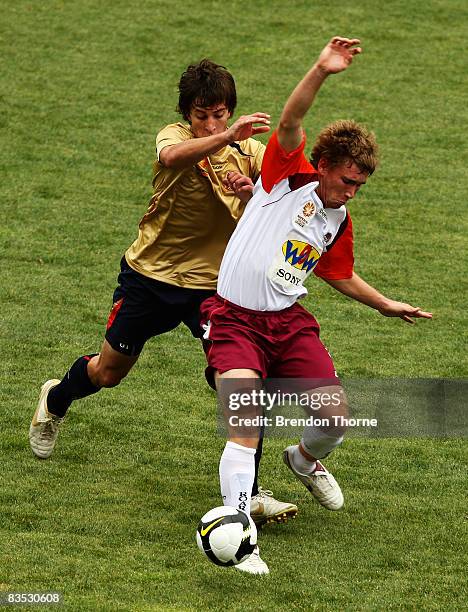 Joel Witherdin of the Jets competes with the Roar forward line during the round six National Youth League match between the Newcastle Jets and the...