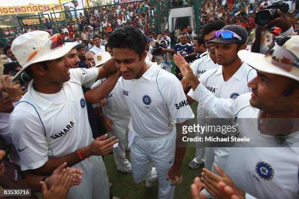 India captain Anul Kumble who announced his retirement from Test cricket is applauded onto the field by his team mates during day five of the Third...