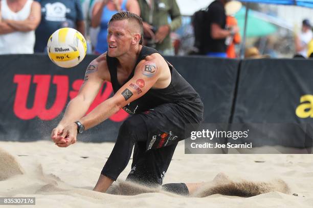 Casey Patterson digs the ball during his round 2 match at the AVP Manhattan Beach Open - Day 2 on August 18, 2017 in Manhattan Beach, California.