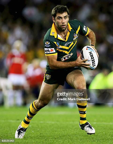 Cameron Smith of the Kangaroos looks to offload during the 2008 Rugby League World Cup Pool 1 match between the Australian Kangaroos and England at...