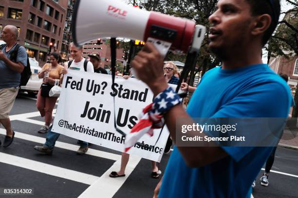 Small group attends a vigil and march at the New England Holocaust Memorial to denounce hate groups before a controversial rally tomorrow on August...