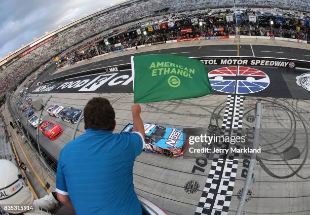 Kyle Busch, driver of the NOS Rowdy Toyota, takes the green flag to start the NASCAR XFINITY Series Food City 300 at Bristol Motor Speedway on August...