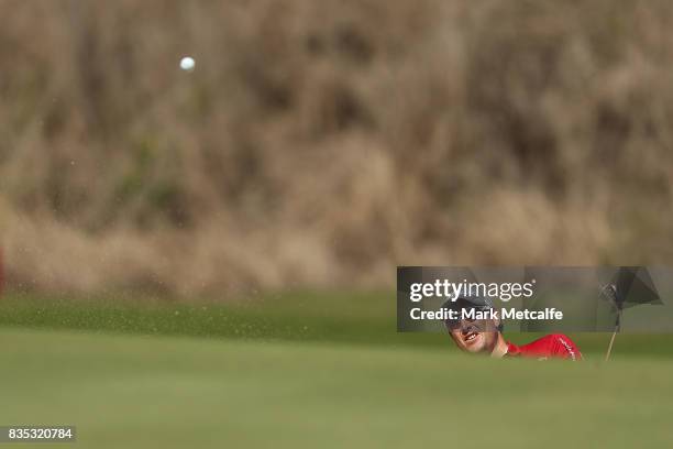 Daniel Pearce of New Zealand hits a bunker shot on the 1st hole during day three of the 2017 Fiji International at Natadola Bay Championship Golf...