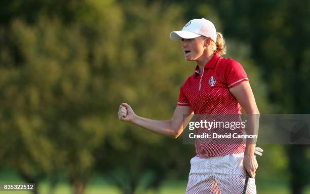 Stacy Lewis of the United States celebrates holing the match winning putt for a birdie on the 17th hole in her match with Gerina Piller against...