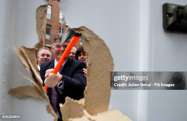 Fianna Fail MEP Eoin Ryan pictured with Green Euro Candidate Deirdre de Burca, Fine Gael's John V Farrelly and Labour's Sean Butler peering through a...