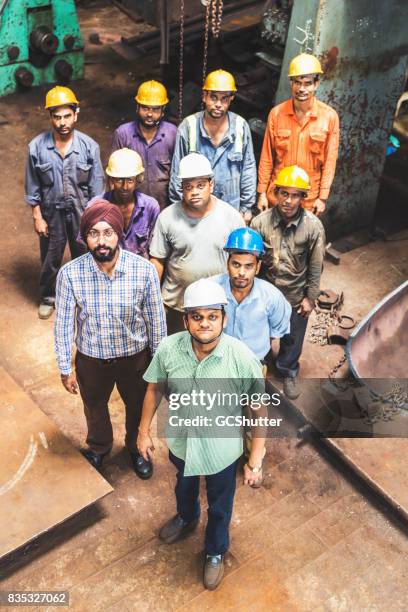 Indian Factory Labourer Photos and Premium High Res Pictures - Getty Images