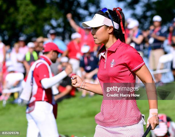 Danielle Kang of Team USA celebrates her birdie putt on the 12th hole during the afternoon four-ball matches of the Solheim Cup at the Des Moines...