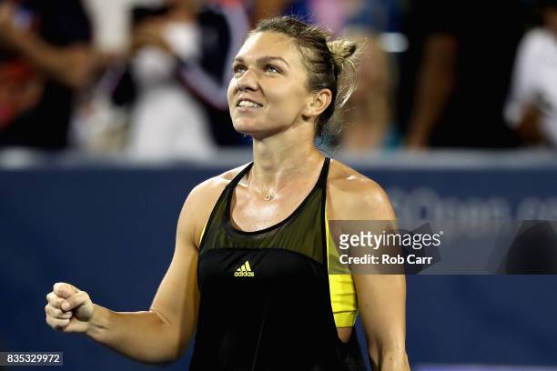 Simona Halep of Romania celebrates after defeating Johanna Konta of Great Britain during Day 7 of the Western and Southern Open at the Linder Family...