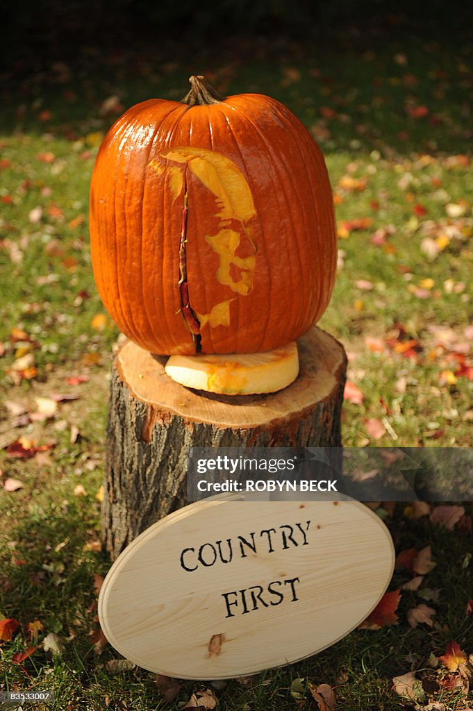 A pumpkin carved with the image of US Re