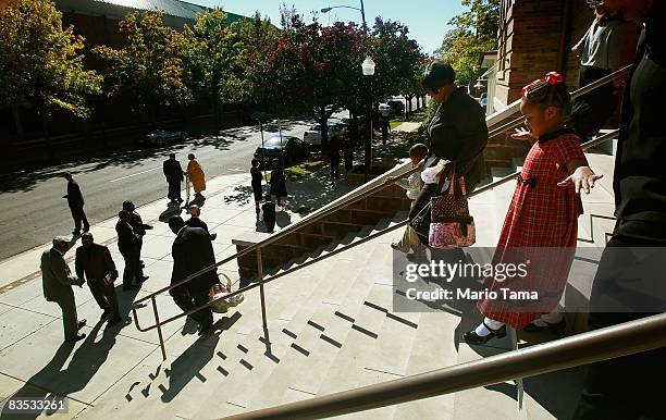 Parishioners exit the historic Sixteenth Street Baptist Church on November 2, 2008 in Birmingham, Alabama. Four young girls were killed in the...