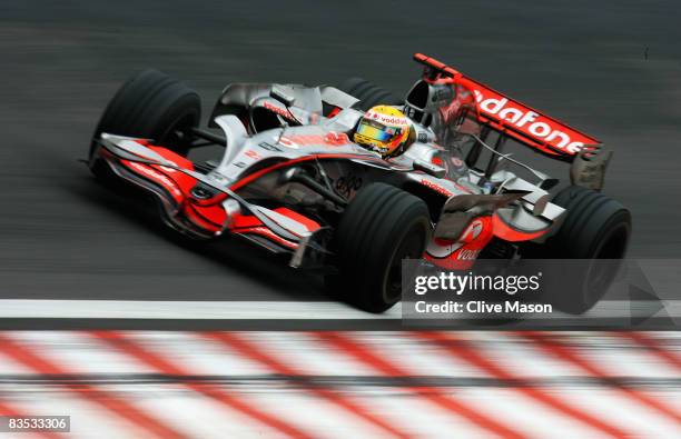 Lewis Hamilton of Great Britain and McLaren Mercedes drives on his way to winning the Formula One World Championship during the Brazilian Formula One...