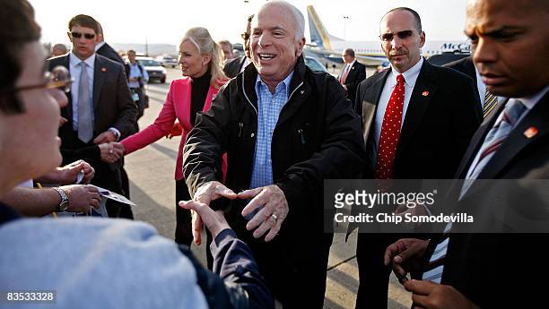 Republican presidential nominee Sen. John McCain greets supporters on the tarmac at the Wilkes-Barre/Scranton International Airport November 2, 2008...