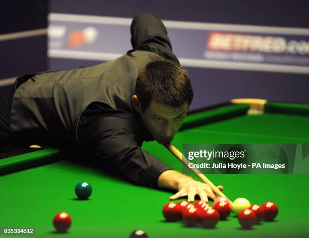 Ronnie O'Sullivan in action against Stuart Bingham during the Betfred.com World Snooker Championship at The Crucible Theatre, Sheffield.