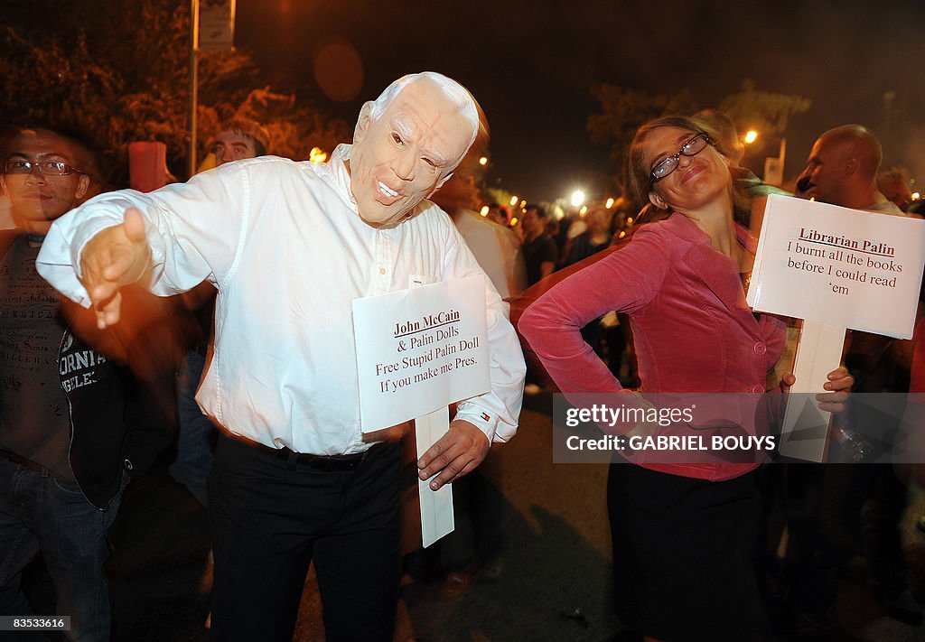 A man wearing a mask of Republican presi