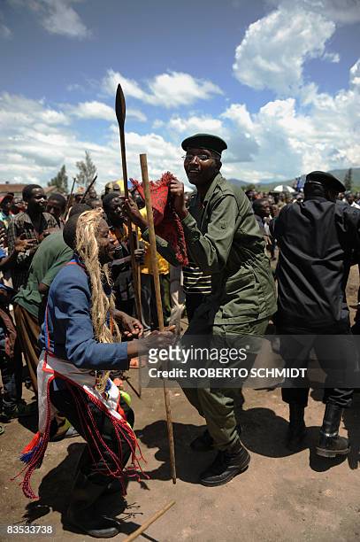 Captain Seco, the younger brother of renegade Congolese General Laurent Nkunda, dances at the local stadium on November 1, 2008 in Rutshuru in a...
