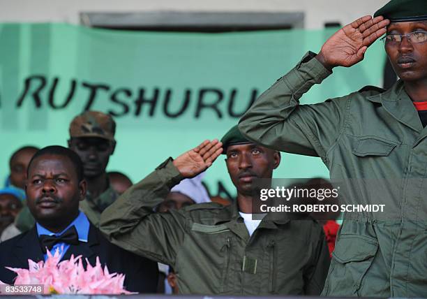 Captain Seco , the younger brother of renegade Congolese General Laurent Nkunda, stands at attention at a local stadium on November 1, 2008 in...