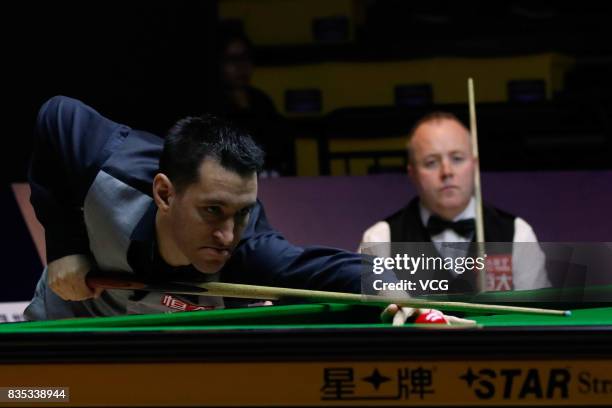 Tom Ford of England plays a shot during his second round match against John Higgins of Scotland on day three of Evergrande 2017 World Snooker China...