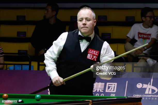 John Higgins of Scotland reacts during his second round match against Tom Ford of England on day three of Evergrande 2017 World Snooker China...