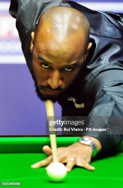 England's Rory McLeod in action against England's Mark King during the Betfred.com World Snooker Championship at The Crucible Theatre, Sheffield.