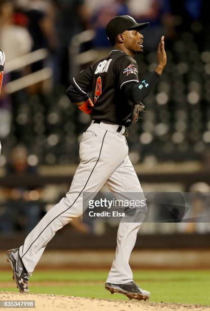 Dee Gordon of the Miami Marlins celebrates the 3-1 win over the New York Mets on August 18, 2017 at Citi Field in the Flushing neighborhood of the...