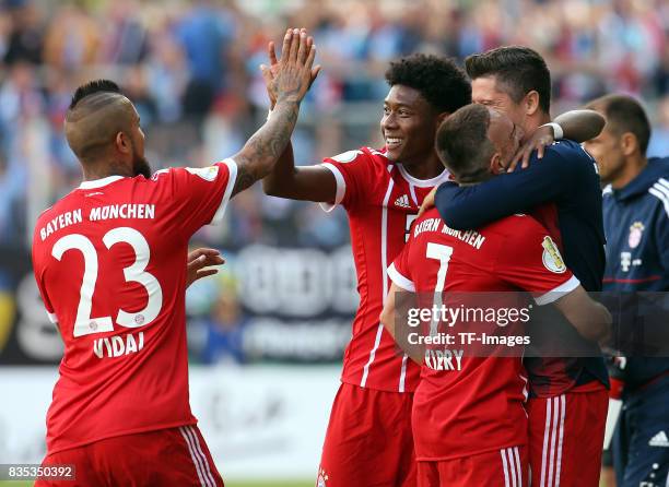 Arturo Vidal of Bayern Muenchen shakes hands with David Alaba of Bayern Muenchen during the DFB Cup first round match between Chemnitzer FC and FC...