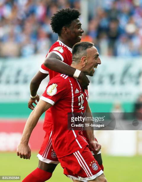 David Alaba of Bayern Muenchen and Franck Ribery of Bayern Muenchen celebrate their win during the DFB Cup first round match between Chemnitzer FC...
