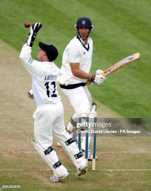 Wawickshire's Tim Ambrose recovers a miss timed cut shot from Hampshire's Nic Pothas during the Liverpool Victoria County Championship match at...