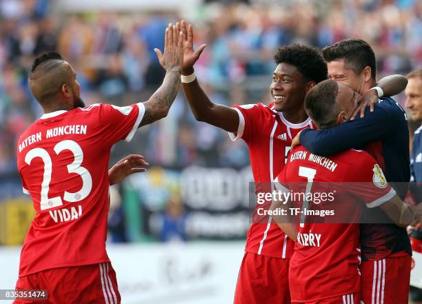 Arturo Vidal of Bayern Muenchen shakes hands with David Alaba of Bayern Muenchen during the DFB Cup first round match between Chemnitzer FC and FC...